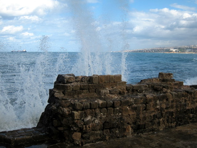 wave splashing against wall